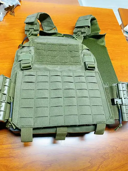 MOLLE panel integrated into a tactical plate carrier