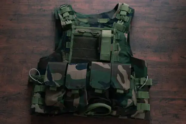 Woodland_camouflaged_body_armor